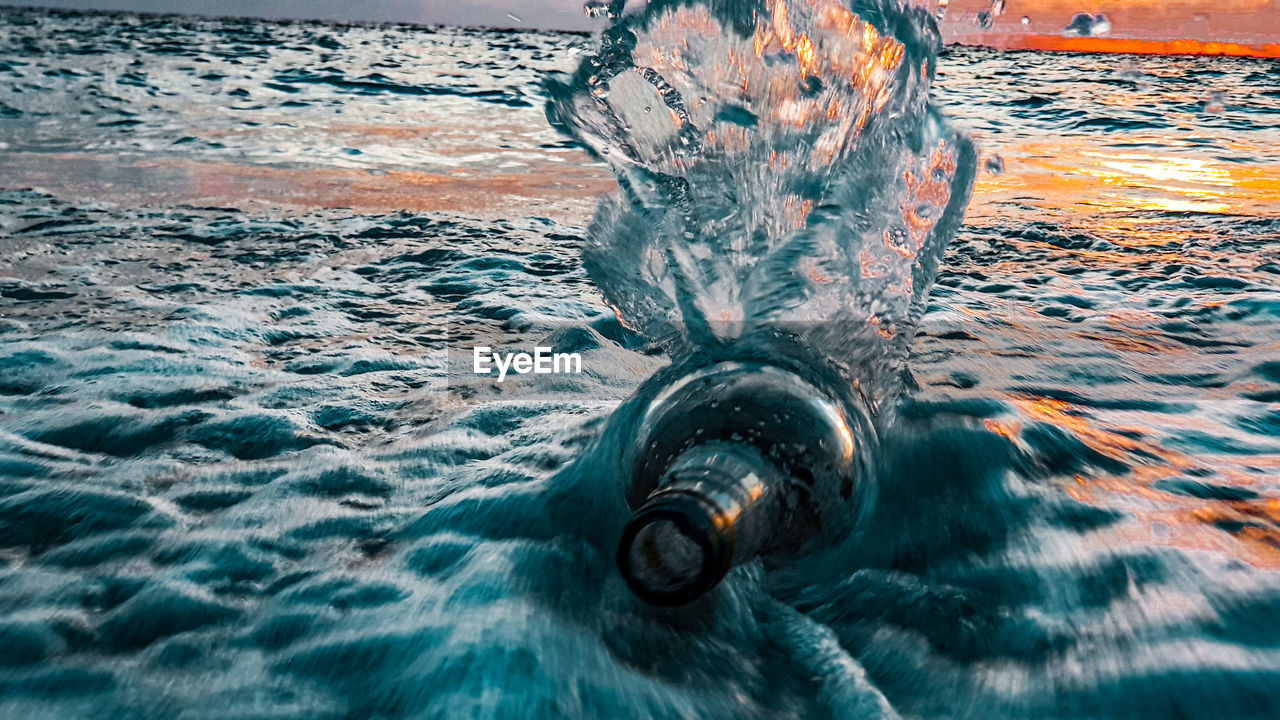 Close-up of water splashing in sea