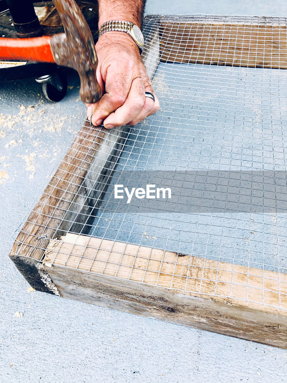 Low section of man working on street