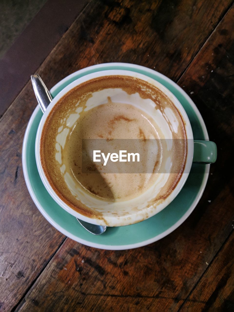 HIGH ANGLE VIEW OF COFFEE CUP WITH TEA