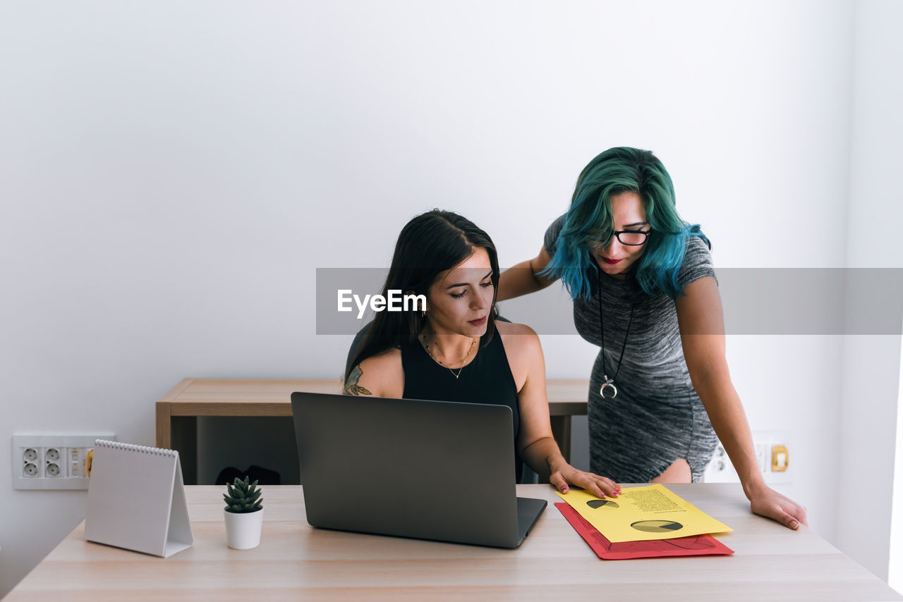 Young business women working in a coworking office