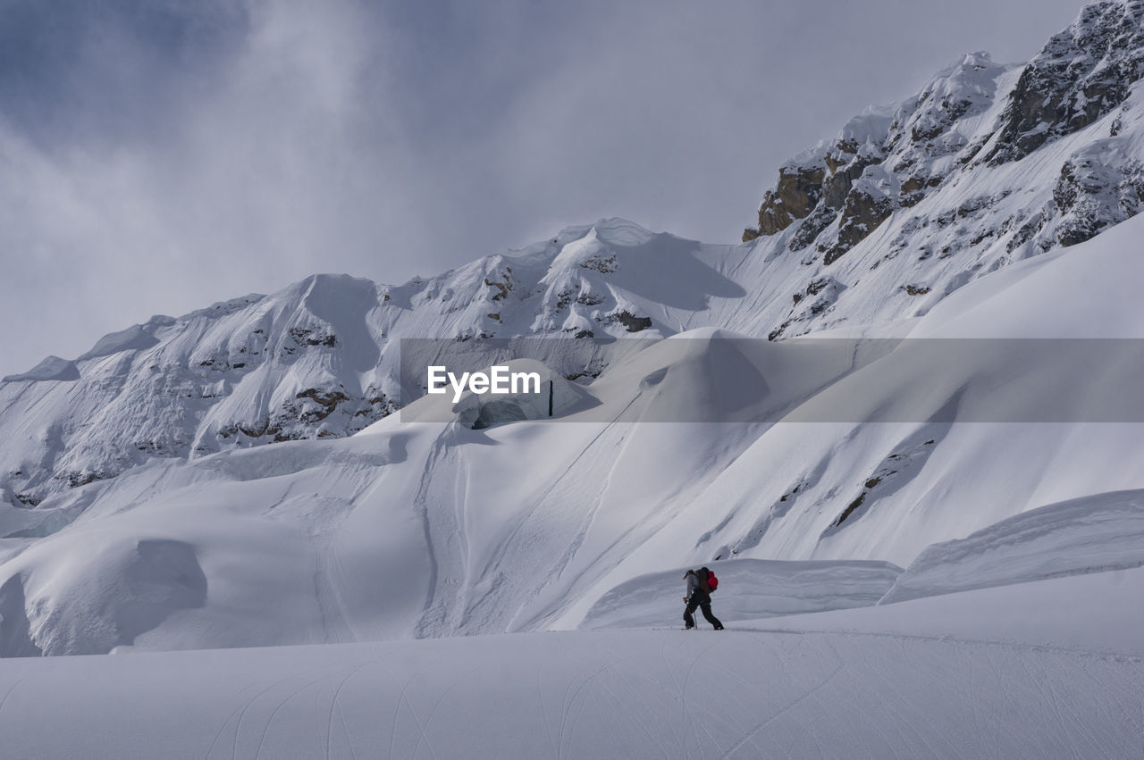 Scenic view of snow covered mountains