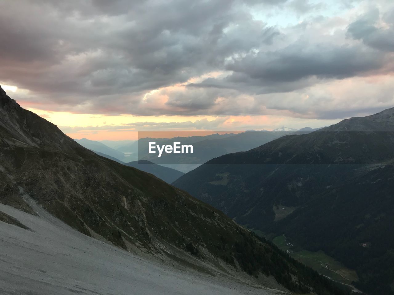 Scenic view of mountains against sky during sunset