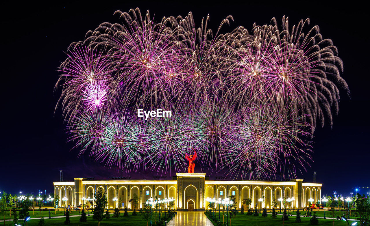 night, fireworks, illuminated, architecture, firework display, event, arts culture and entertainment, celebration, built structure, motion, travel destinations, sky, building exterior, exploding, nature, city, no people, new year's eve, outdoors, recreation, water, travel
