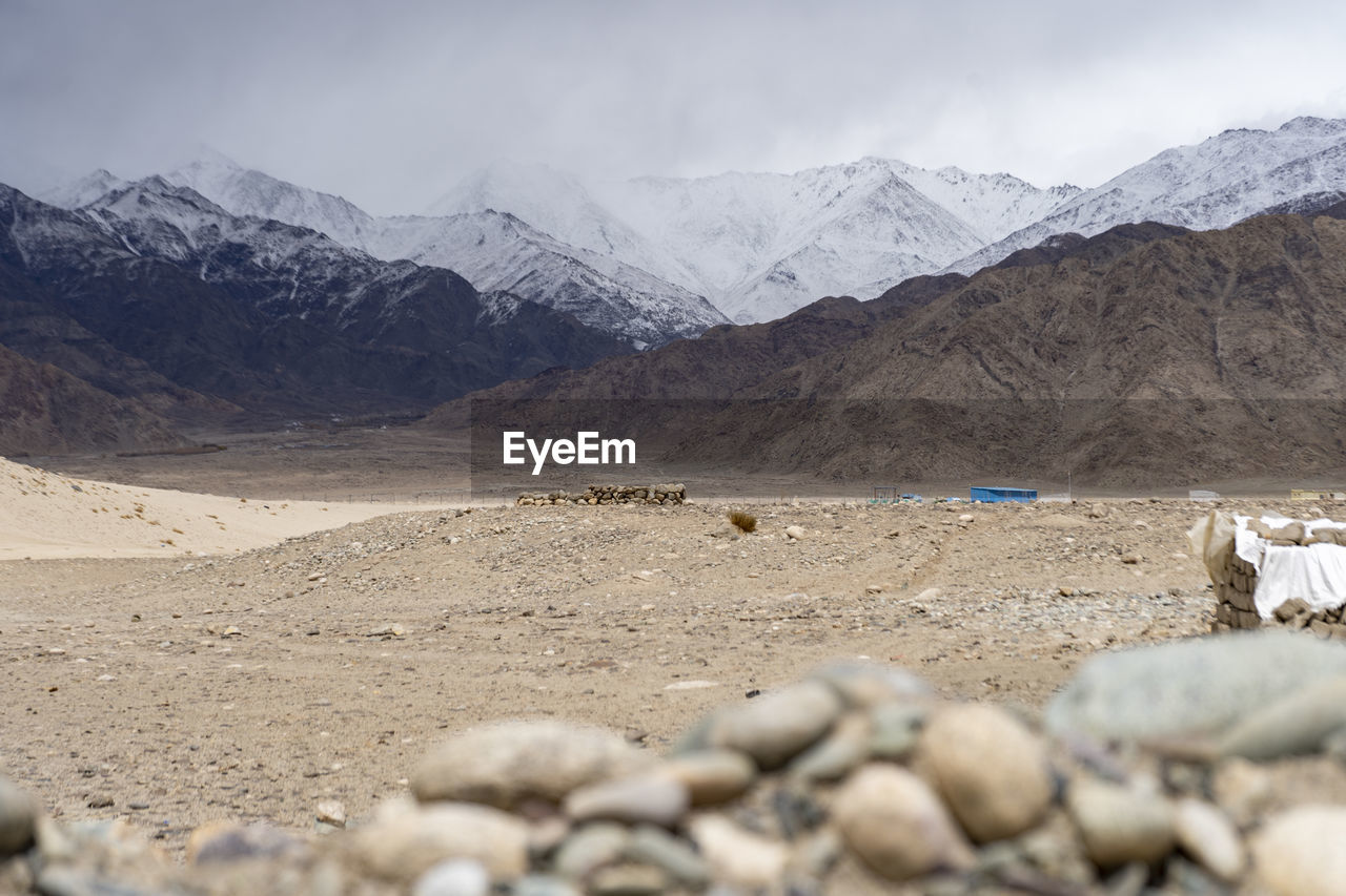 Landscape of ladakh, with snow mountains captured during the winter season. ladakh tourism.
