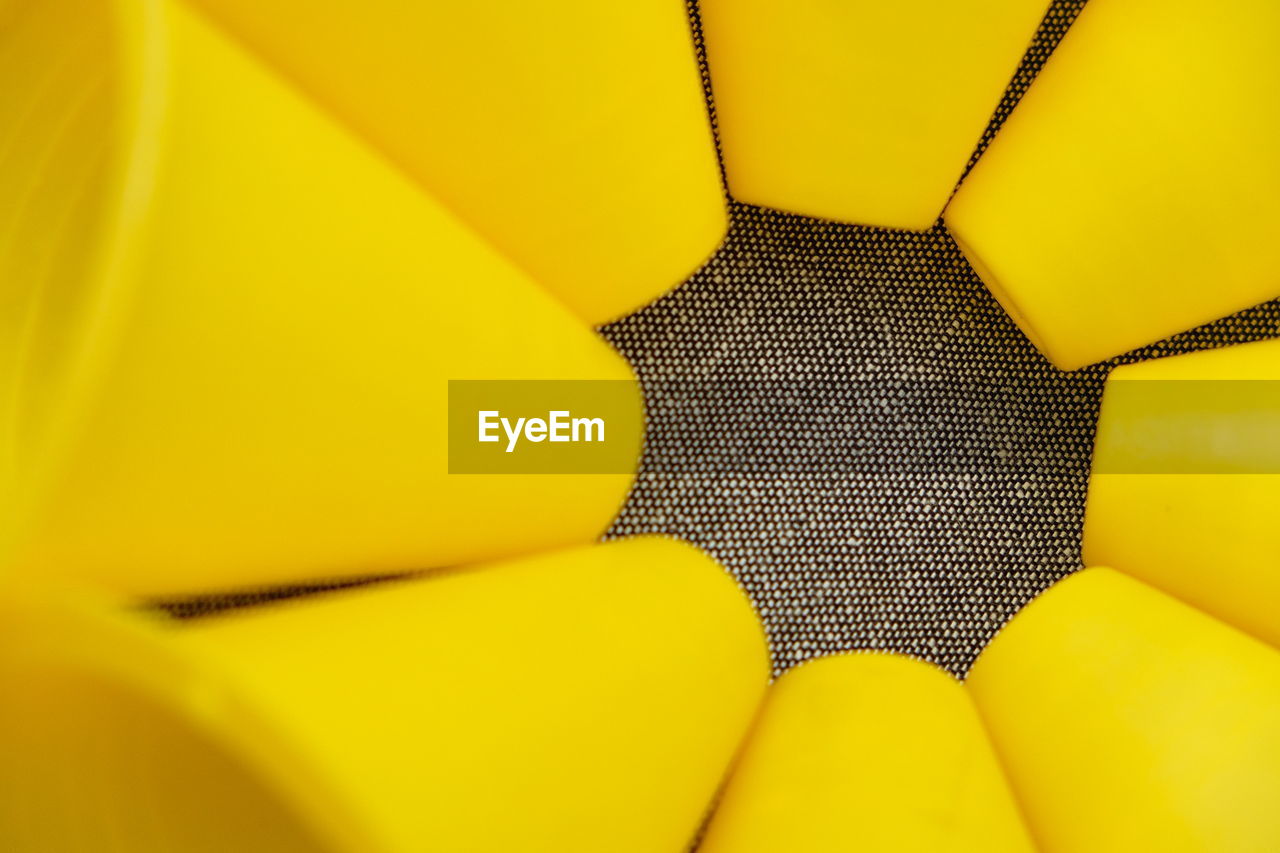 FULL FRAME SHOT OF YELLOW PATTERN ON WALL