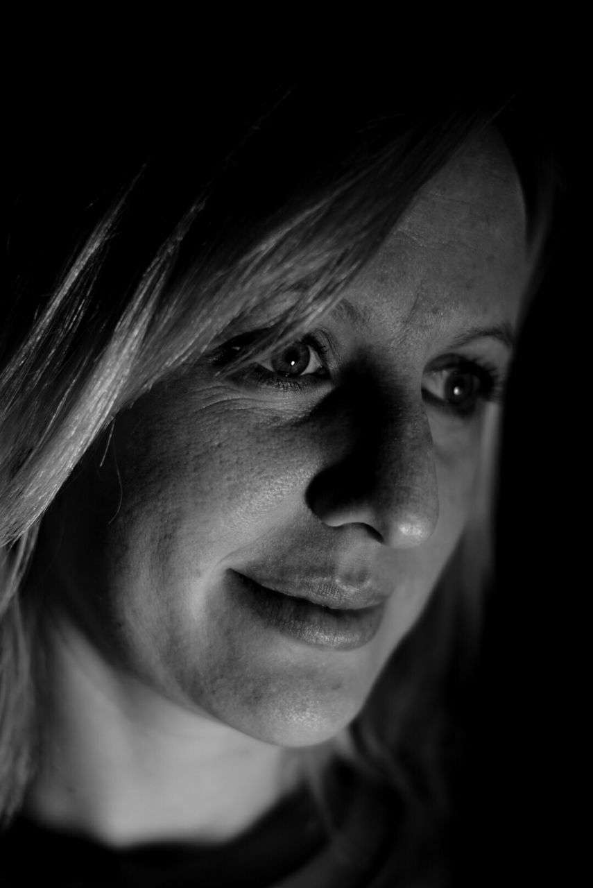 PORTRAIT OF YOUNG WOMAN