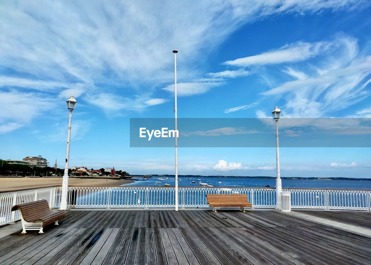 Street by pier against sky in arcachon in france 