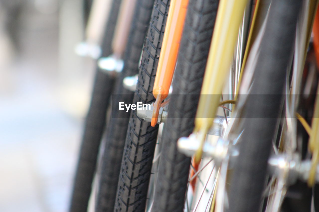 Close-up of bicycle on railing