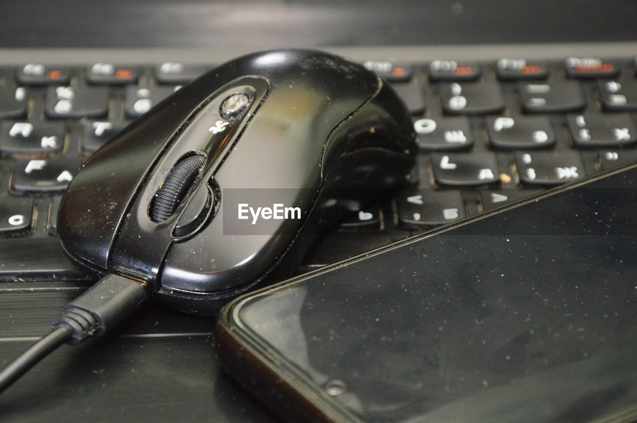 CLOSE-UP OF TELEPHONE ON TABLE