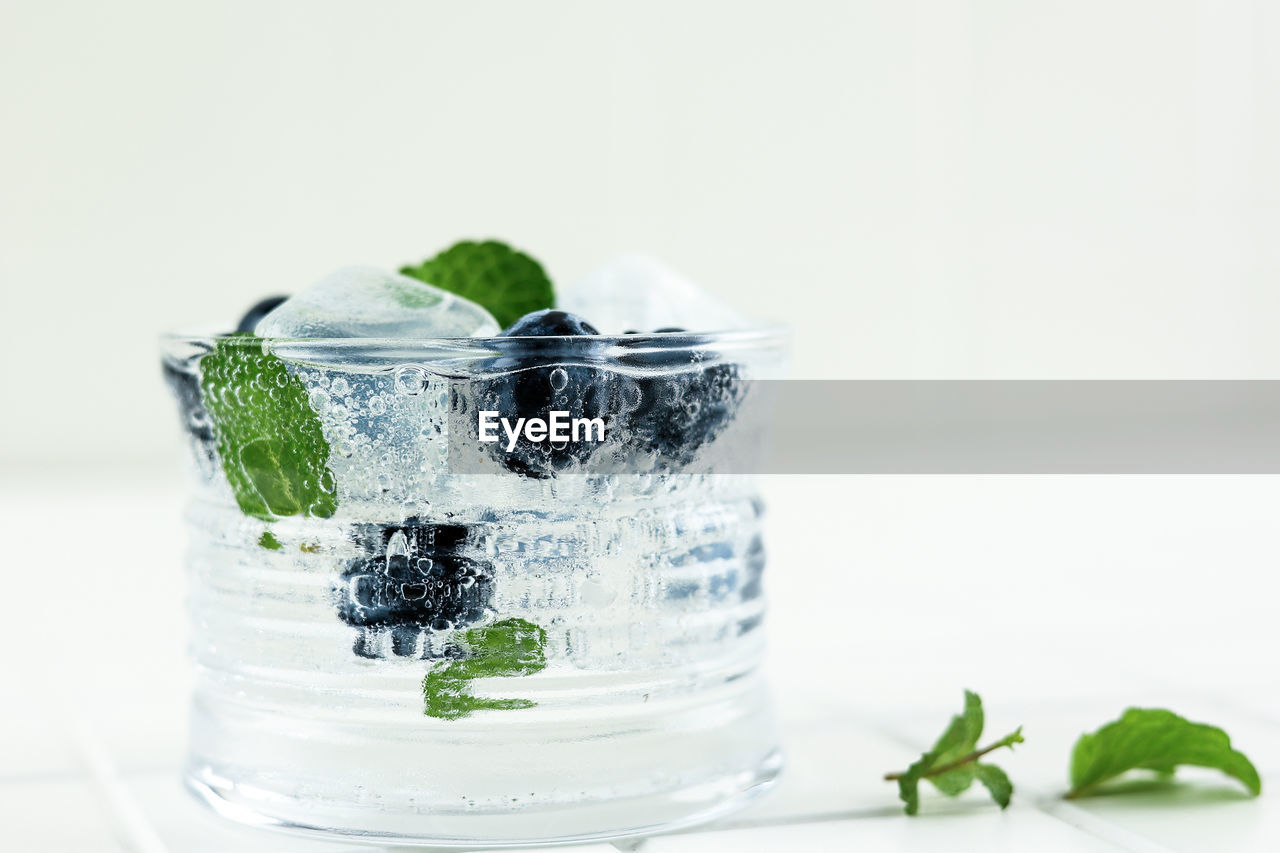 close-up of drink in jar on table