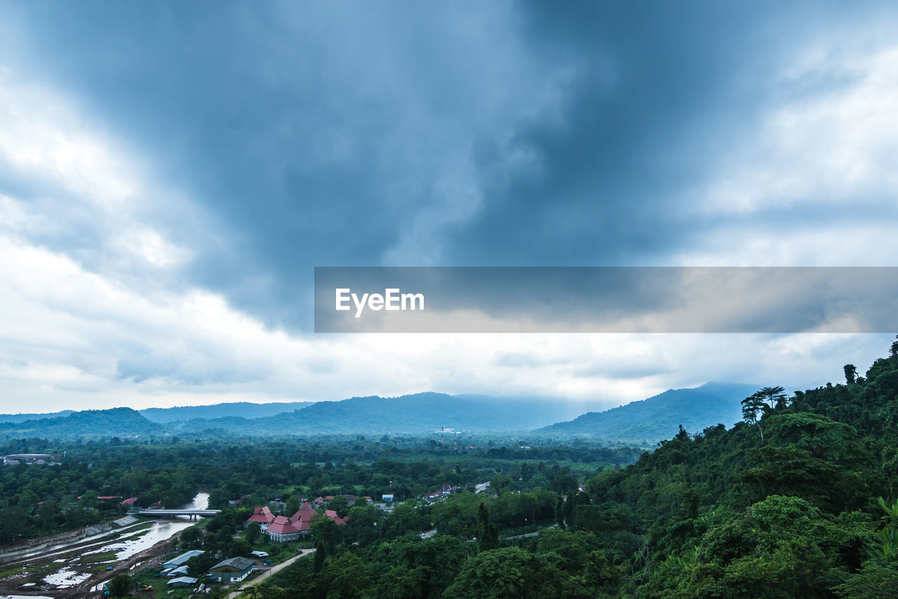 SCENIC VIEW OF TREE MOUNTAINS AGAINST SKY