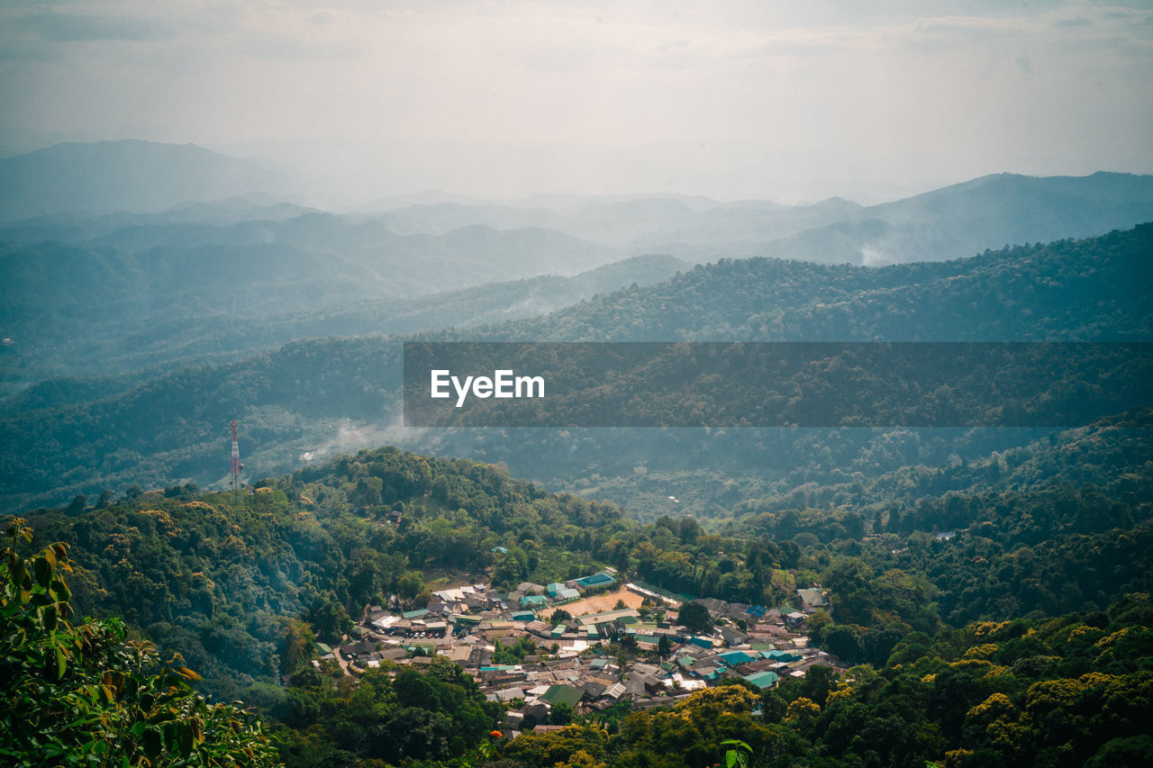 High angle view of townscape against mountains