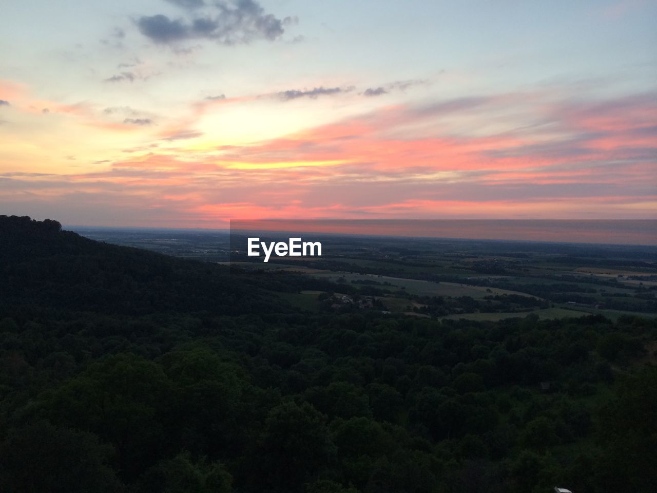 HIGH ANGLE VIEW OF LANDSCAPE AGAINST SUNSET SKY