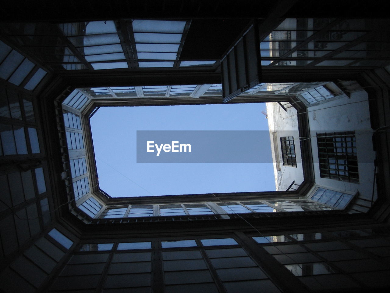 Low angle view of building with skylight