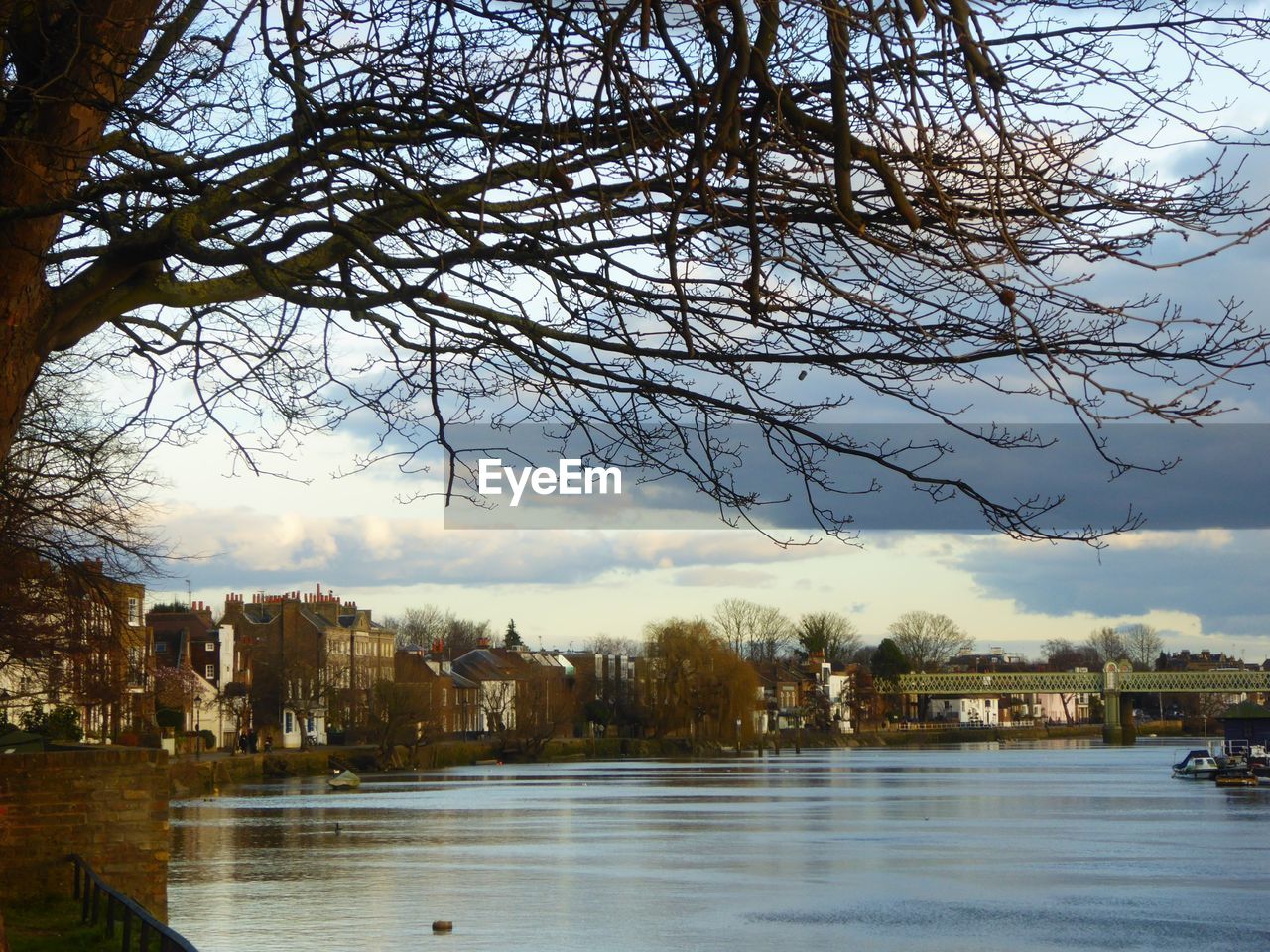 RIVER WITH BUILDINGS IN BACKGROUND