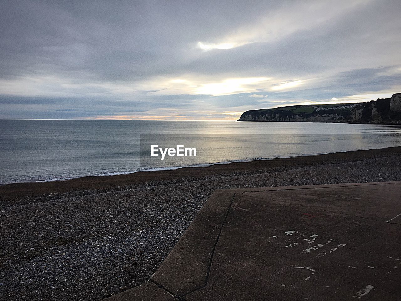 BEACH AGAINST SKY