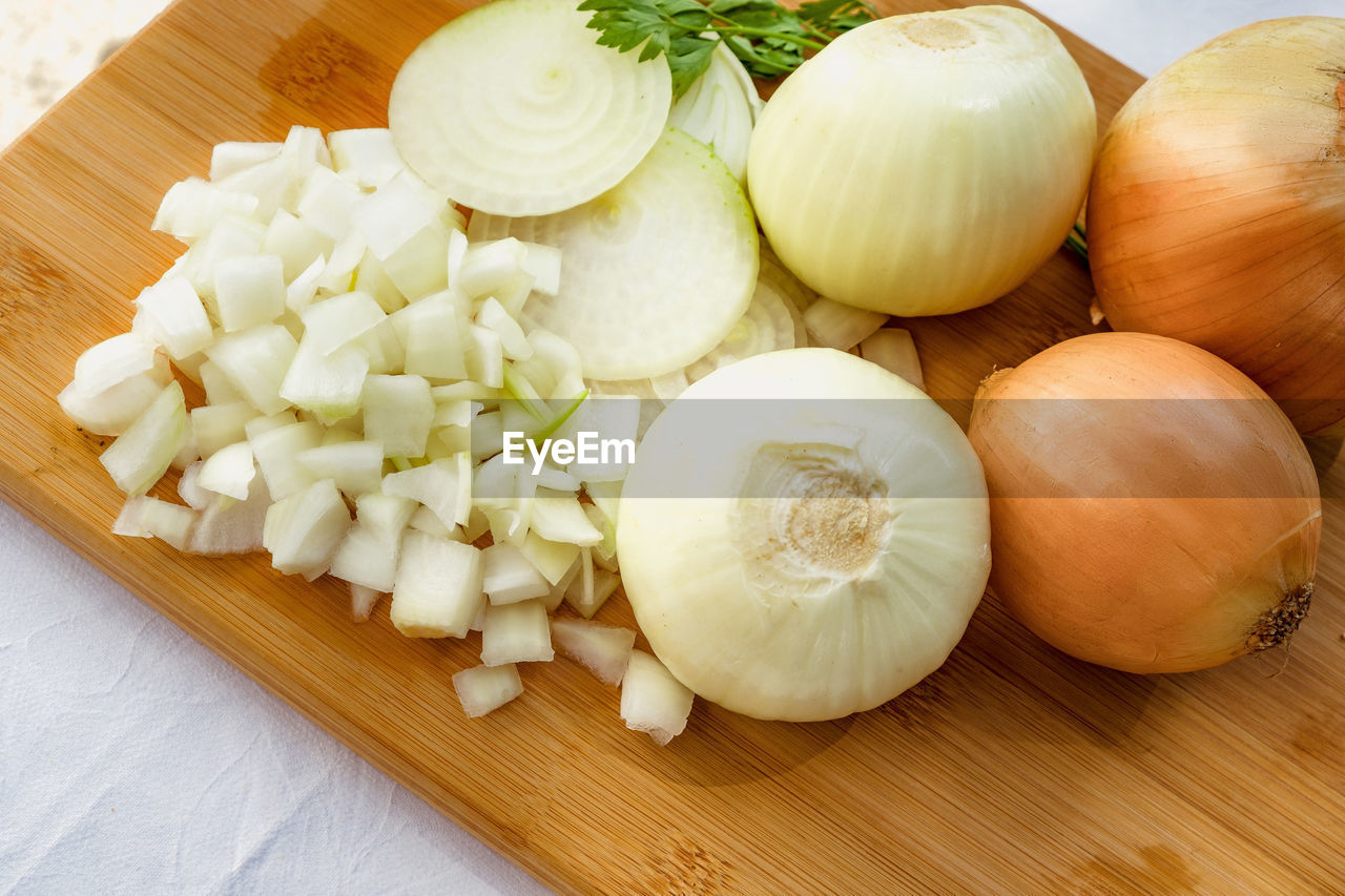 Close-up of chopped onion on cutting board