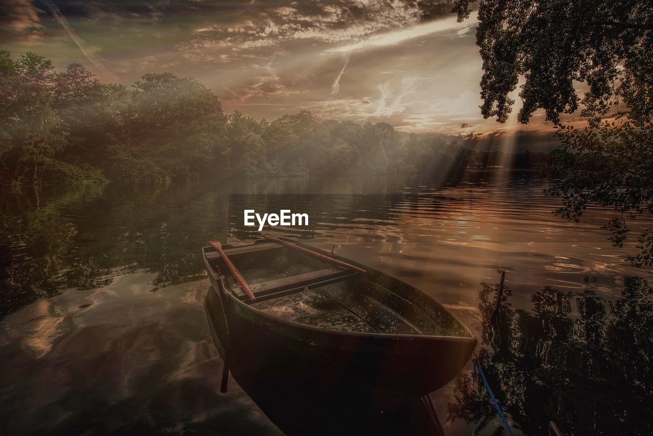 Boat moored in lake