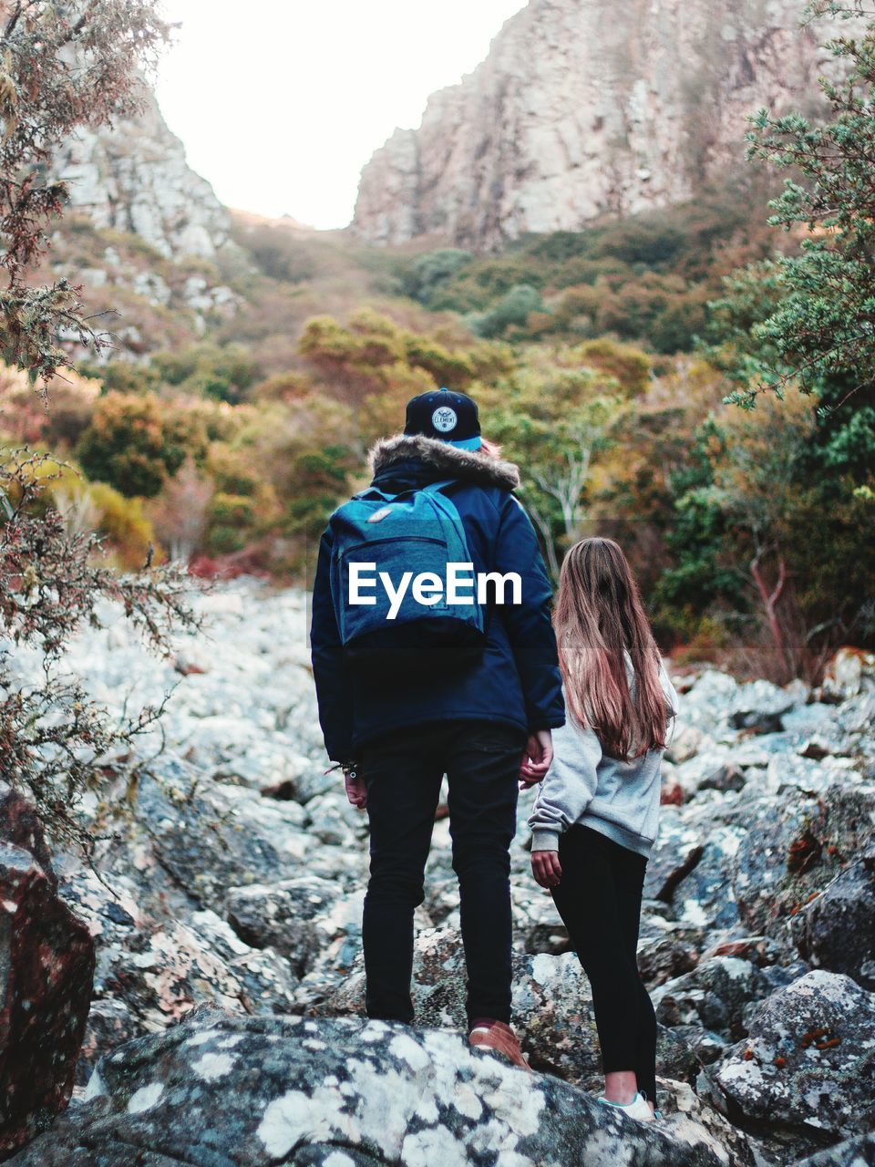 Parent and daughter on mountain