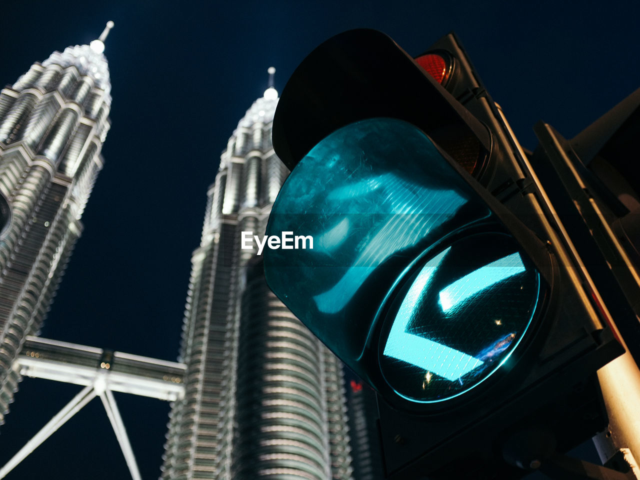 low angle view of illuminated street light against sky at night