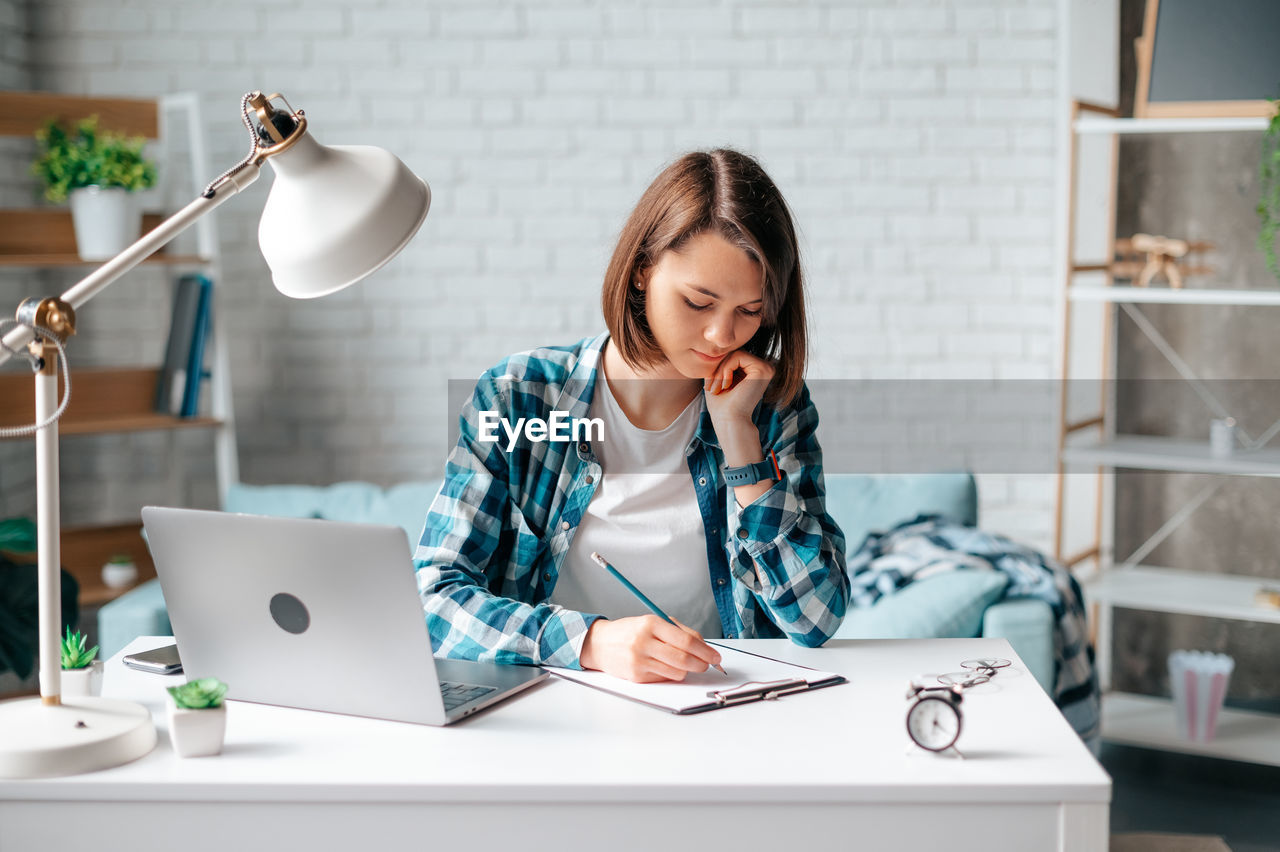 Woman working at home