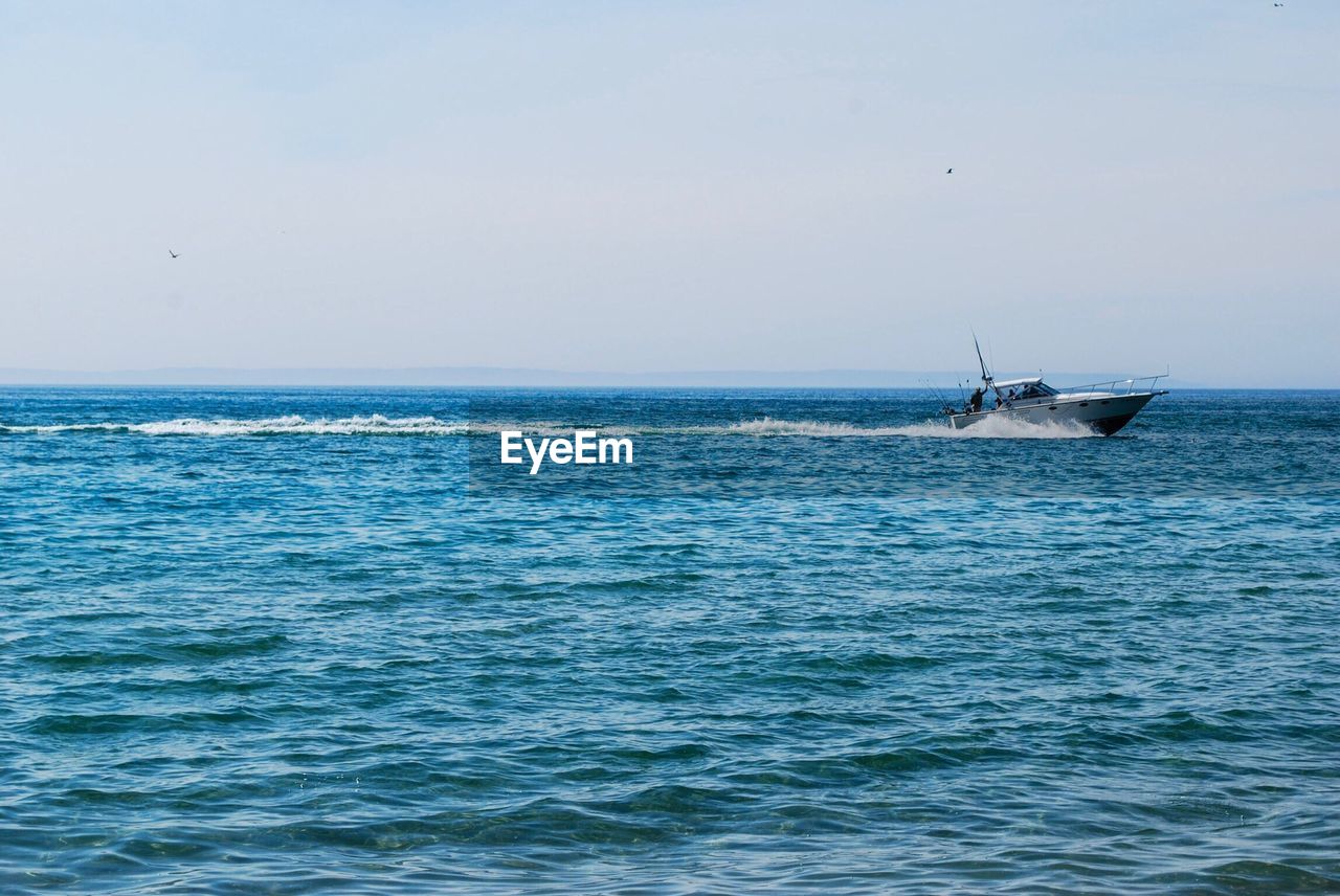 Scenic view of sea against clear sky