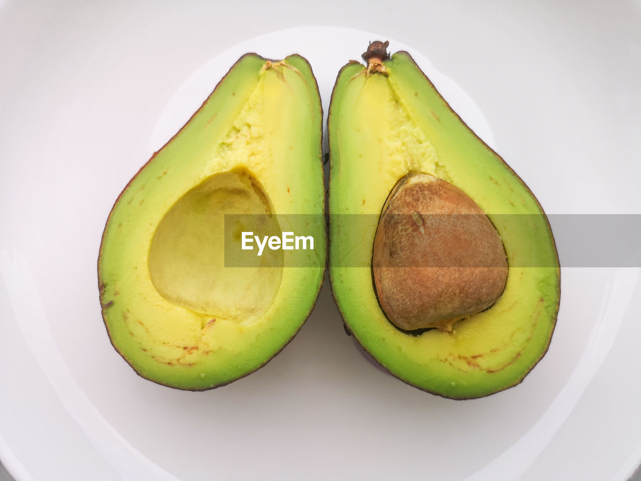 Close-up of fruits in plate avocado