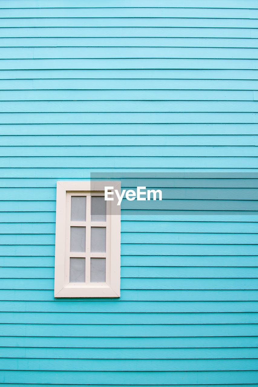 Full frame shot of blue window of building