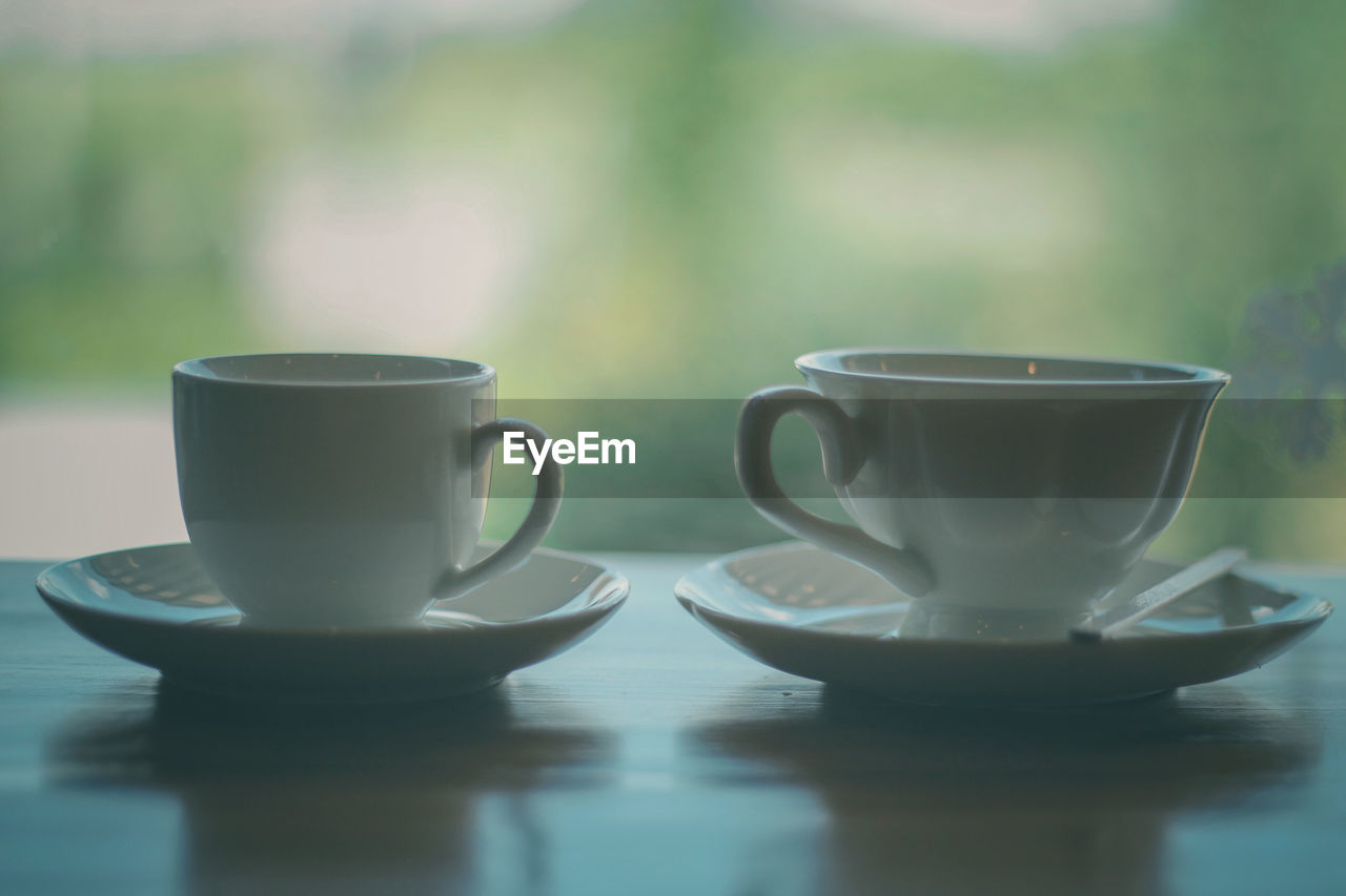 Close-up of coffee cup on table