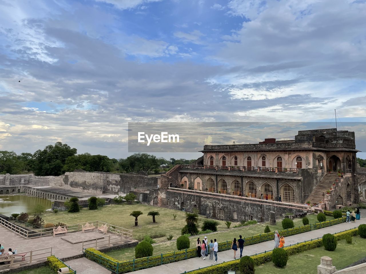 architecture, history, the past, built structure, travel destinations, sky, travel, tourism, building exterior, cloud, ancient, city, nature, landmark, group of people, memorial, high angle view, tourist, large group of people, monument, outdoors, plant, old, crowd, arts culture and entertainment, cityscape, ancient history, old ruin, building, holiday, vacation, trip, ruins, estate, ancient civilization