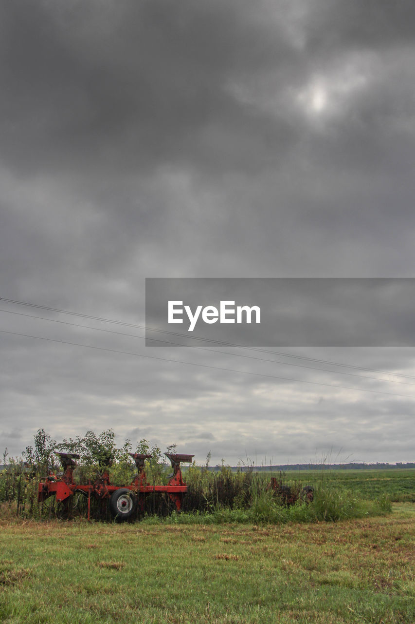 SCENIC VIEW OF LANDSCAPE AGAINST CLOUDY SKY