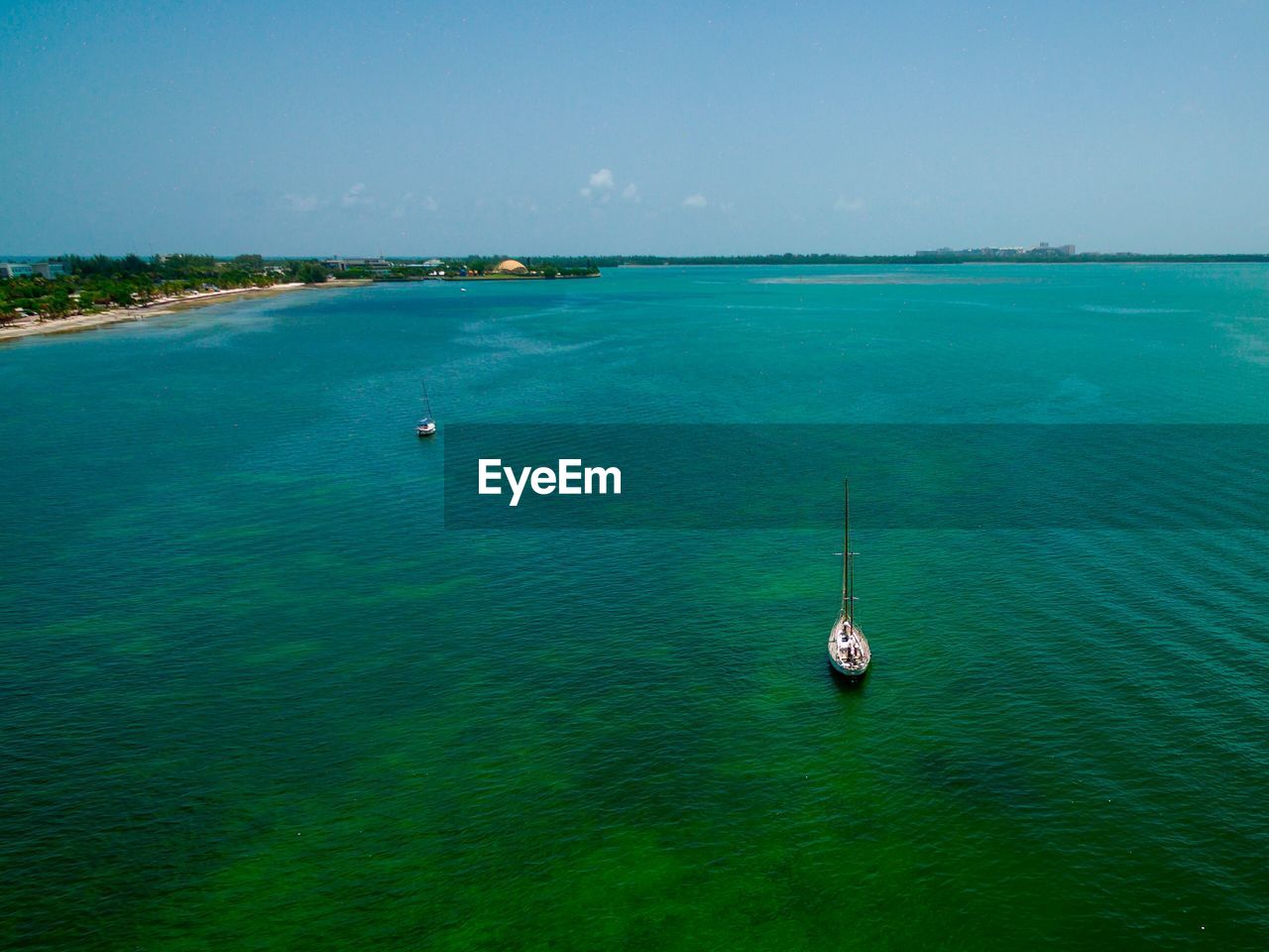 High angle view of sailboat in sea against sky