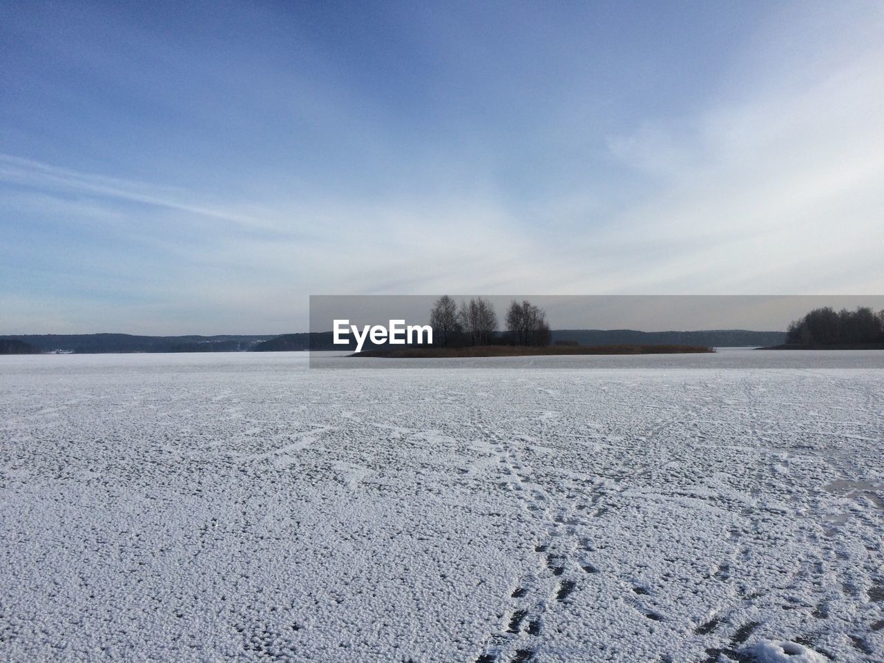 Scenic view of winter against sky