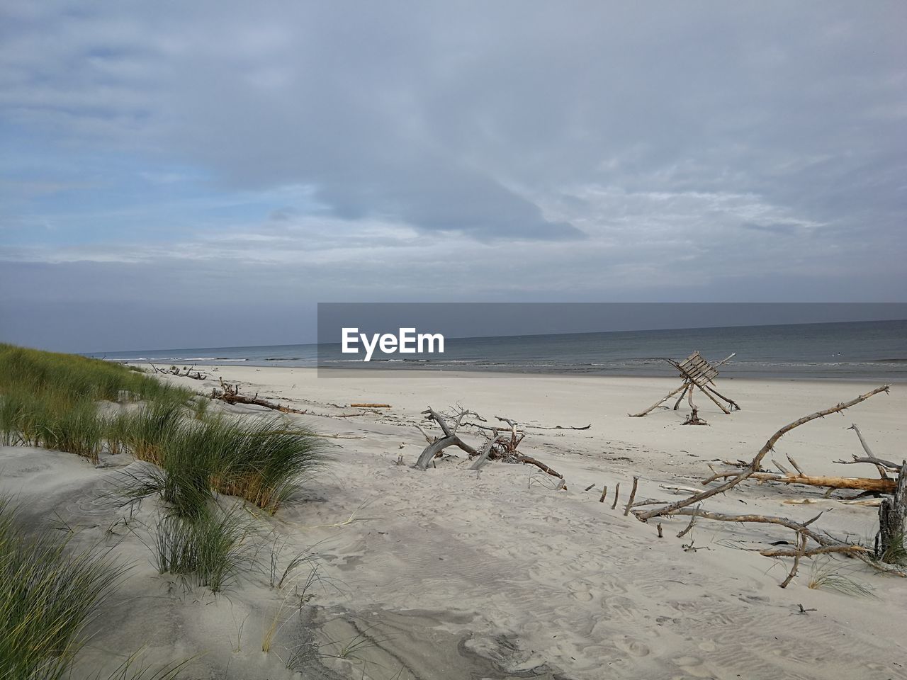 Scenic view of beach against sky