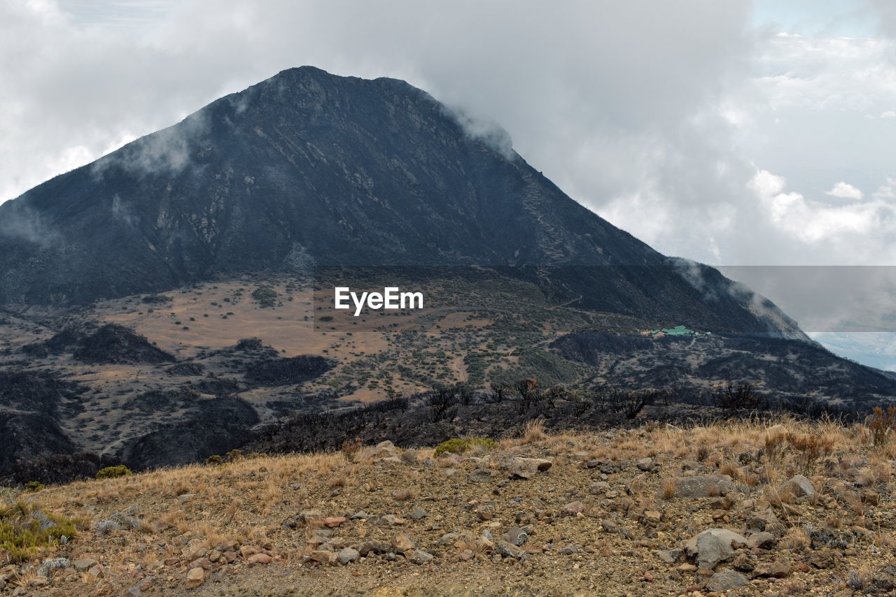 Scenic mountain against sky, little meru in arusha national park, tanzania 