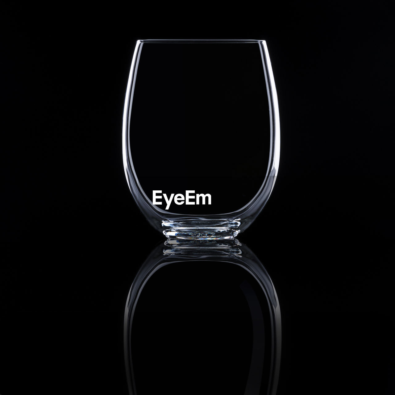 Water glass on black background