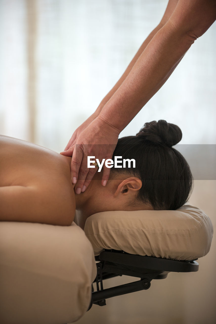 A woman getting a massage in the edgewood spa in stateline, nevada.