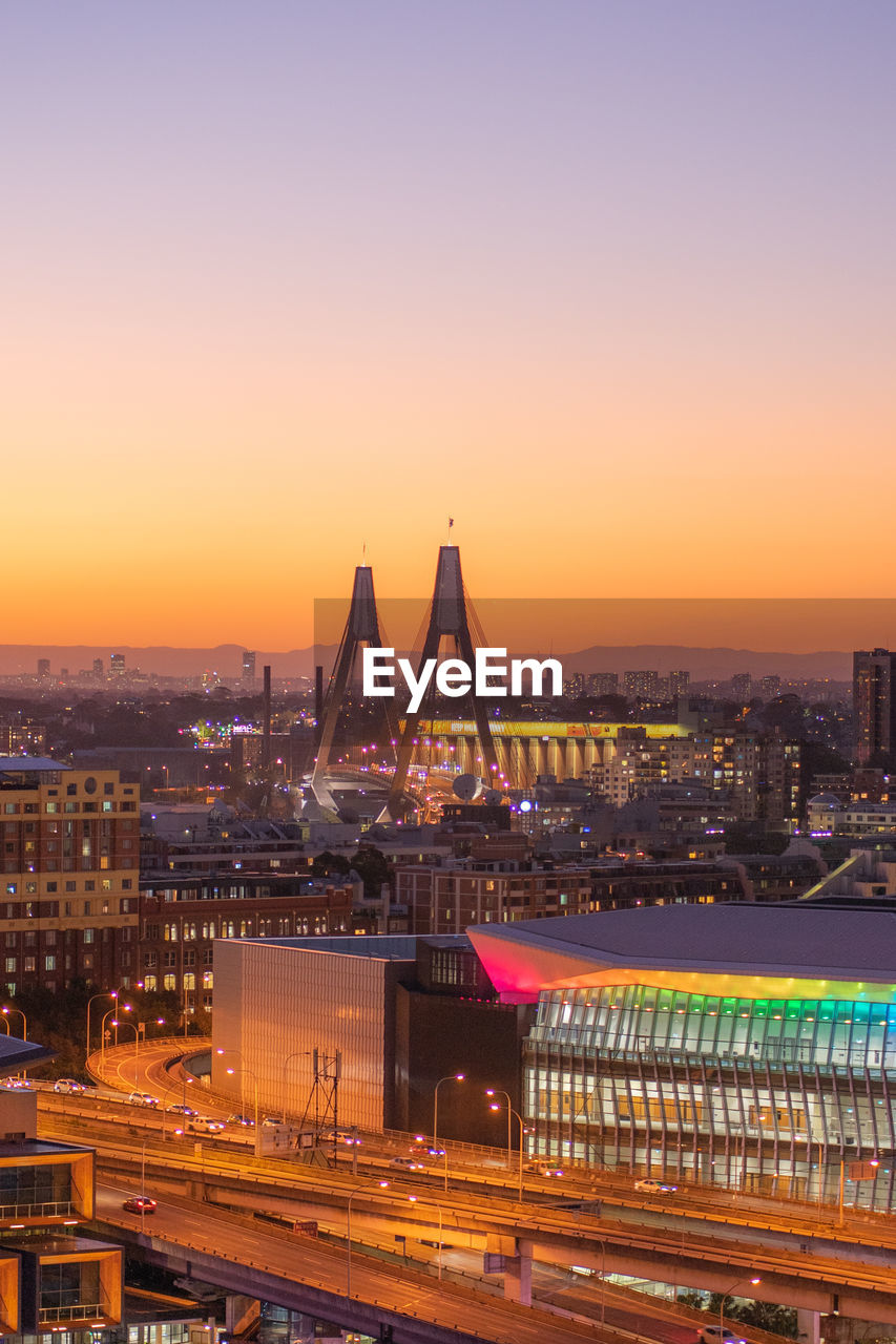 AERIAL VIEW OF CITY AT SUNSET