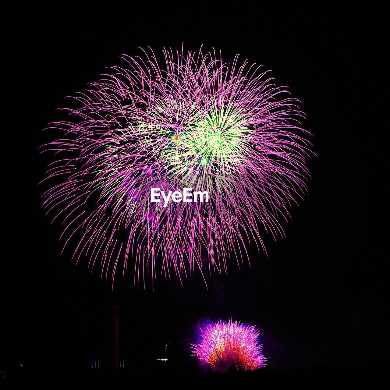 Colorful fireworks display in sky at night