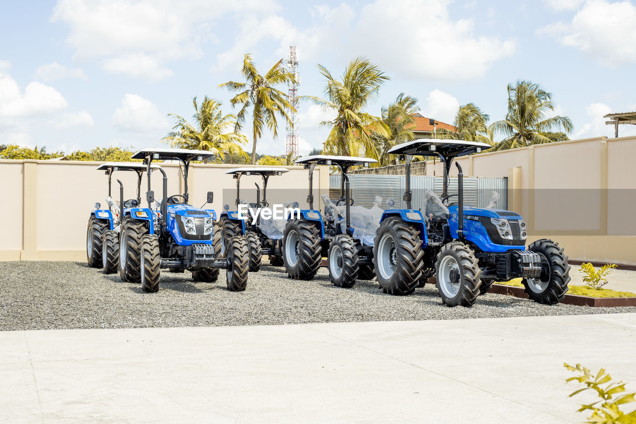 Rear view of blue tractors 