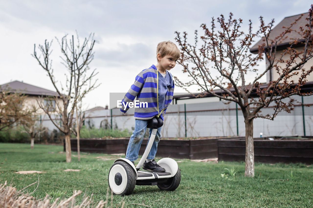 Boy playing on field