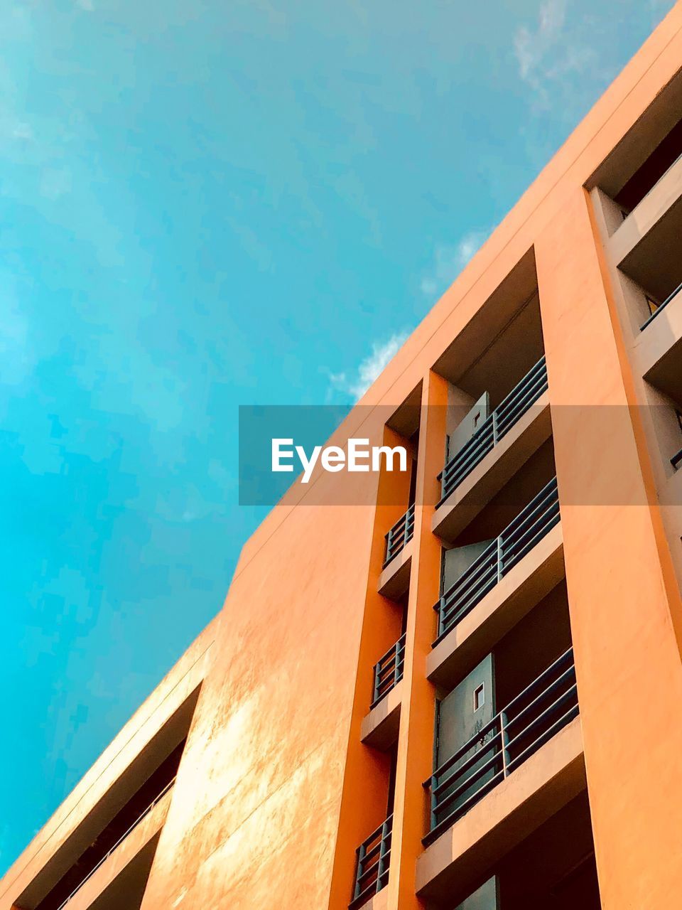 Low angle view of building against blue sky