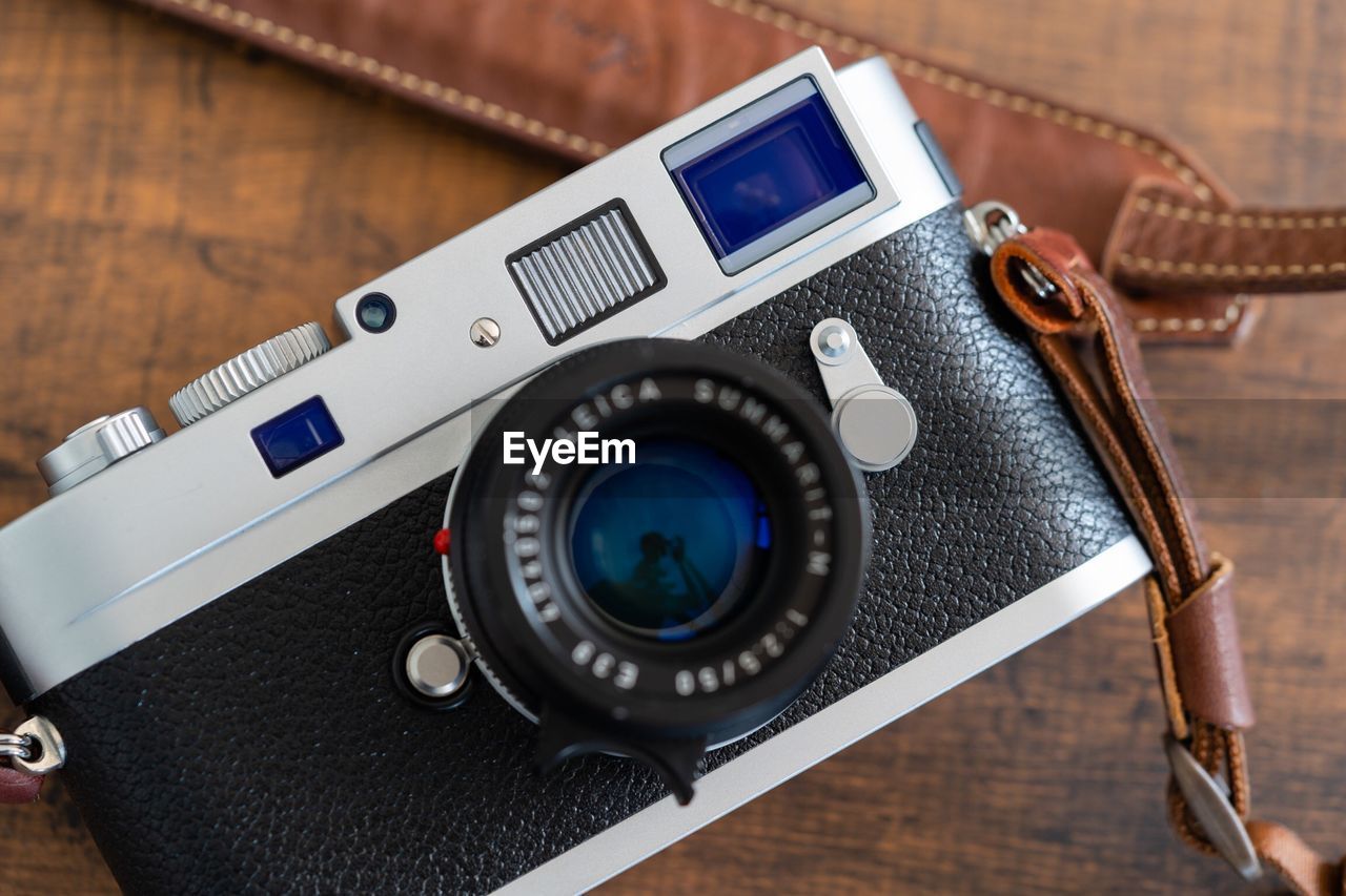 Close-up of camera on table