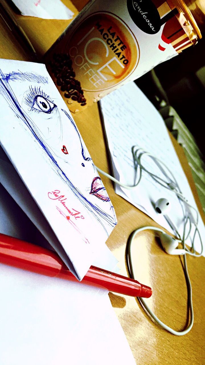 HIGH ANGLE VIEW OF PAPER AND TABLE ON SHELF