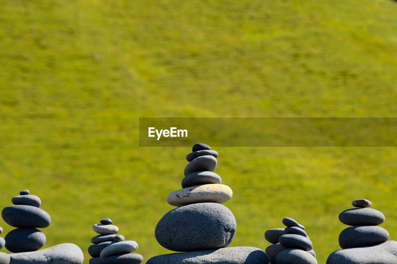 Stack of stones on field