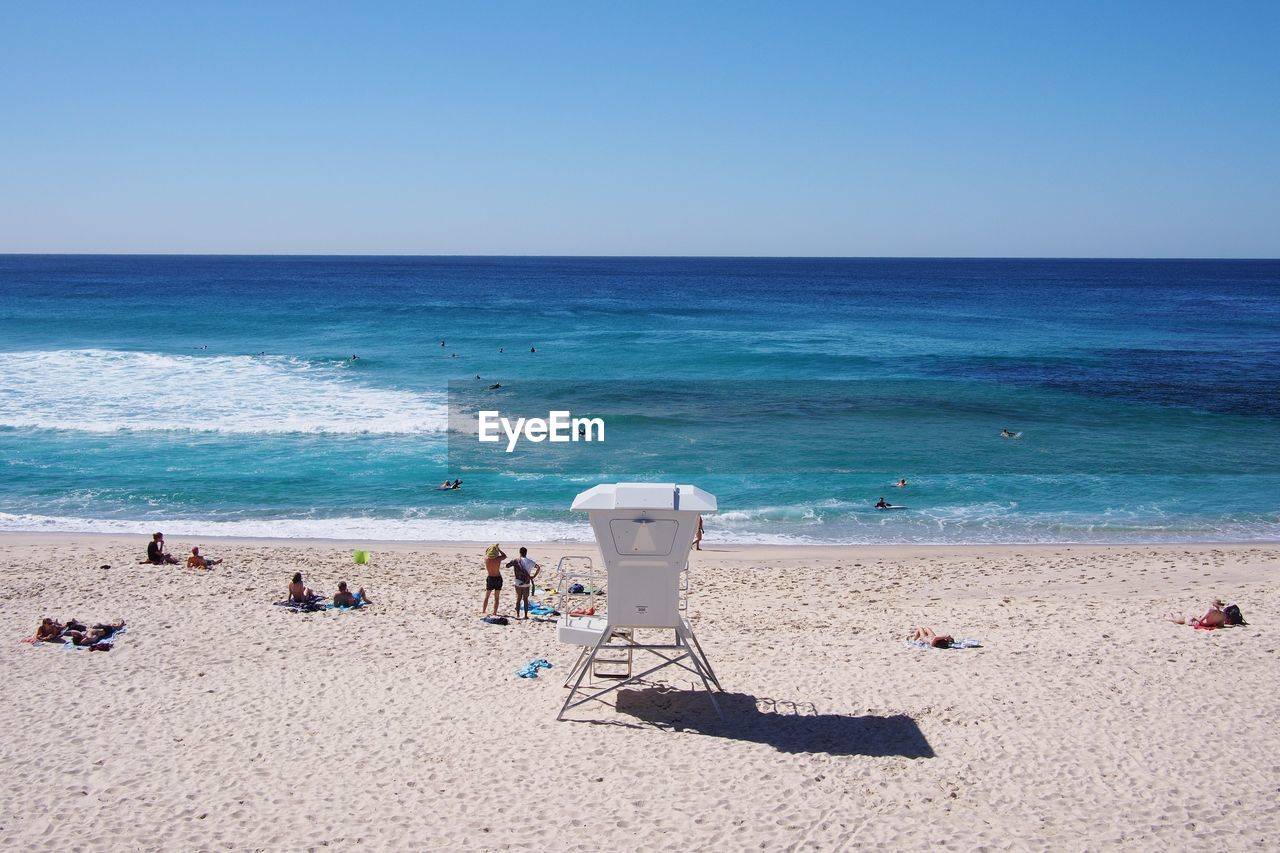 High angle view of people relaxing at bronte beach against clear blue sky