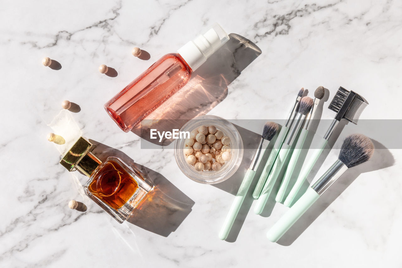 Makeup flat lay. professional makeup. brushes, perfume and other decorative cosmetic. 