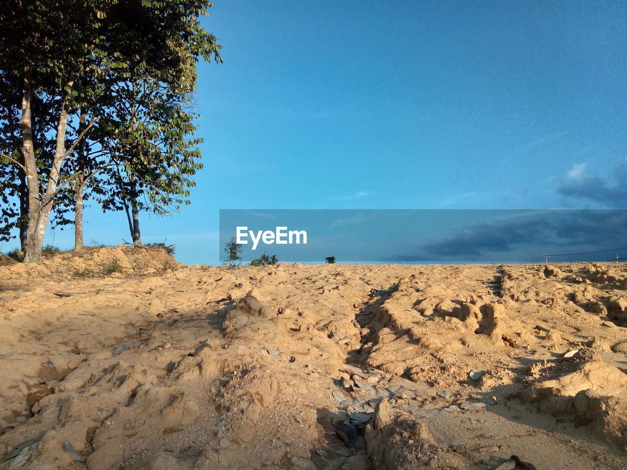 Scenic view of land against sky