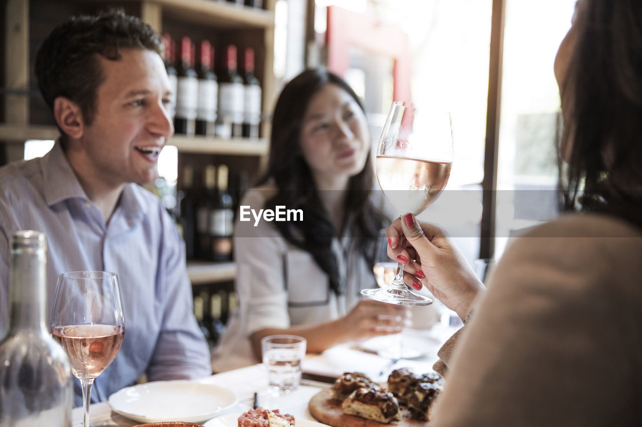 Business people having food while meeting restaurant