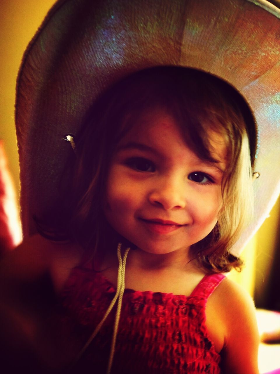 Young girl in cowboy hat